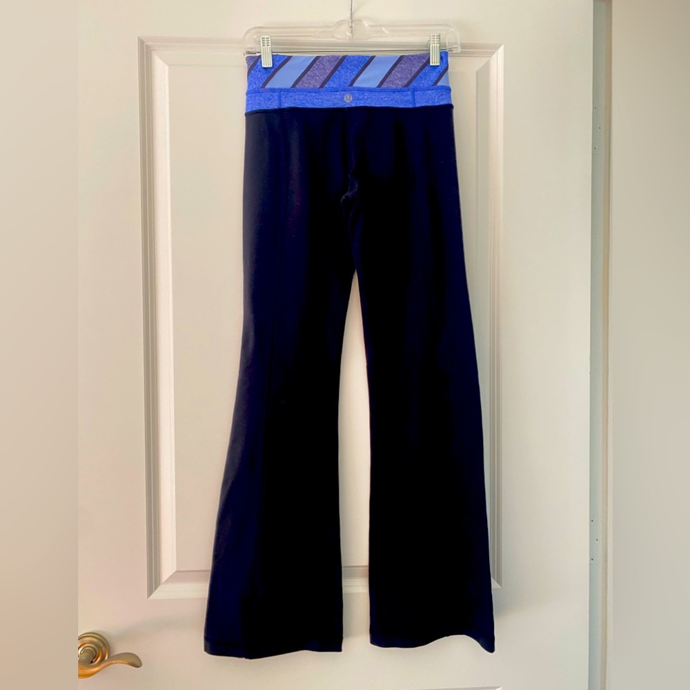 Lululemon Black with Blue Strip Reversible Flare Yoga Pants.